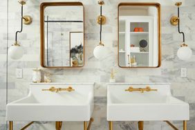 brass console sinks in bathroom