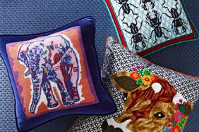 needlepoint pillows with an elephant, beetles, and a cow