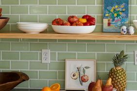 fruit on counter with green tile