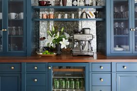 Butler pantry with blue cabinet