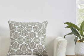 patterned pillow on couch