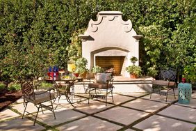 backyard patio with large fireplace