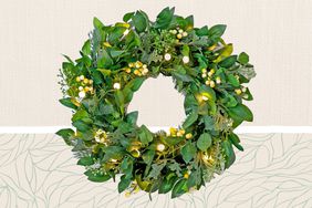 Balsam Hill White Berry Cypress Wreath on a gray background