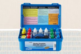 One of the best pool test kits on a tan patterned background.