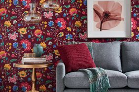 floral wallpapered living room