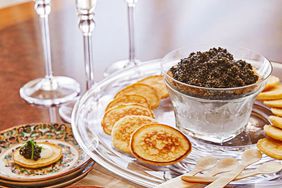Caviar corn cakes on serving platter