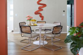 colorful painted dining room with Marcel Breuer Cesca chairs
