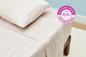 The Parachute Sateen Sheet Set on a bed with a pillow and a BHG Recommends badge.