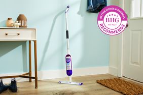 Swiffer Powermop leans against wall with BHG recommends badge in upper left corner