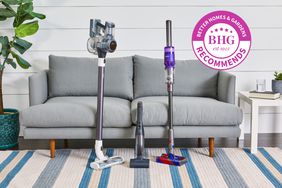 group shot of three Cordless Vacuums in a living room, in front of a sofa tout