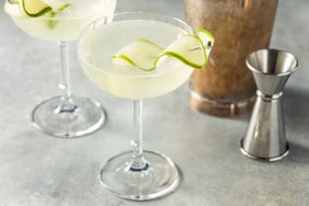 Saketini in martini glass with cucumber garnish