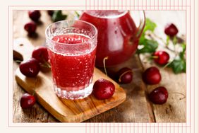 Cherry juice in glass and pitcher