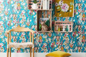 Blue wallpaper with bright floral print