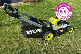 The Ryobi 40V HP Self-Propelled Mower unfolded and sitting on a lawn
