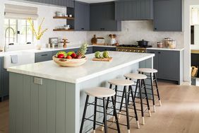blue-gray and white kitchen with island