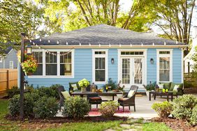blue house with backyard patio