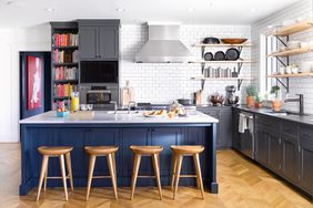 blue island in a kitchen with open shelving