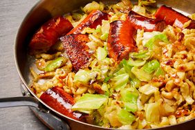 Cabbage and Kielbasa in skillet over noodles