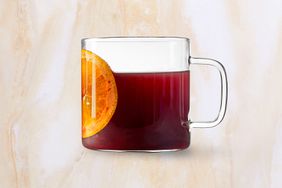 cranberry mulled wine or cider in glass mug