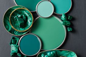 deep green can paint lids with marble jade and paintbrush