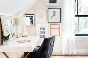dormer home office with blush pink walls and black accents