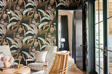 Sitting room with botanical wallpaper