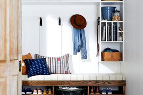 Entryway with bench and shelves