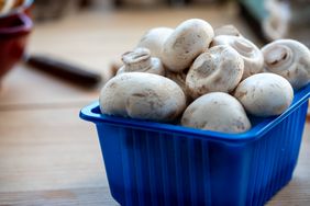 basket of white button mushrooms