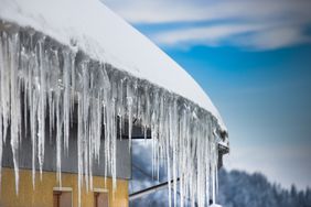 ice dams on roof of home