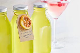 limoncello in bottles with cocktail