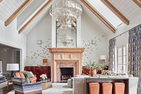 living room in orange and blue vaulted ceiling