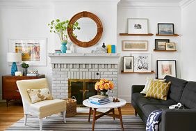 modern white living room with gray painted brick fireplace