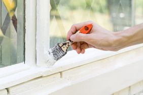 Painting wooden window trim with paint on glass