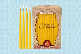 Ner Mitzvah Handmade Beeswax Chanukah Candles on a blue background