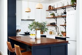 white kitchen with dark blue and wood accents