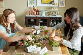 terrarium-making party women succulents table jars